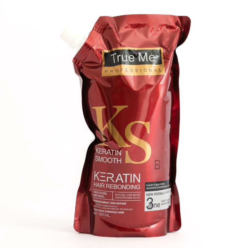 packet of True Me Keratin Hair Rebonding Cream with branding and product information displayed.