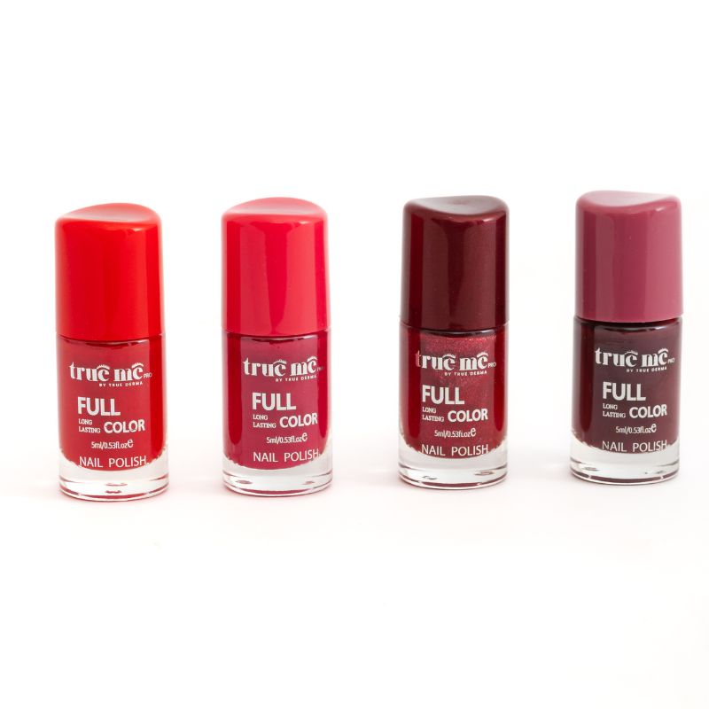 A set of four nail polishes in a line, with the bottle tips showing the color of each polish, from left to right: red, maroon, purple, and black.