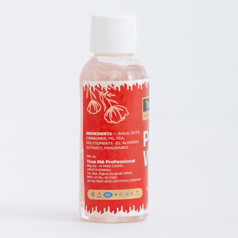 A bottle of True Me Professional Pre Wax Gel with a red label and white cap.